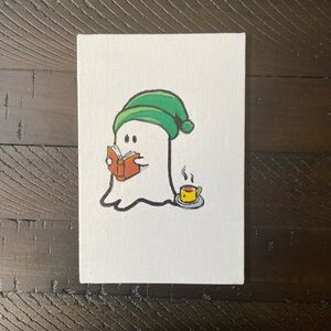 Ghost Reading Canvas Art with Green Hat